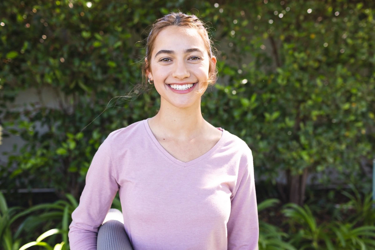 A smiling woman outdoors