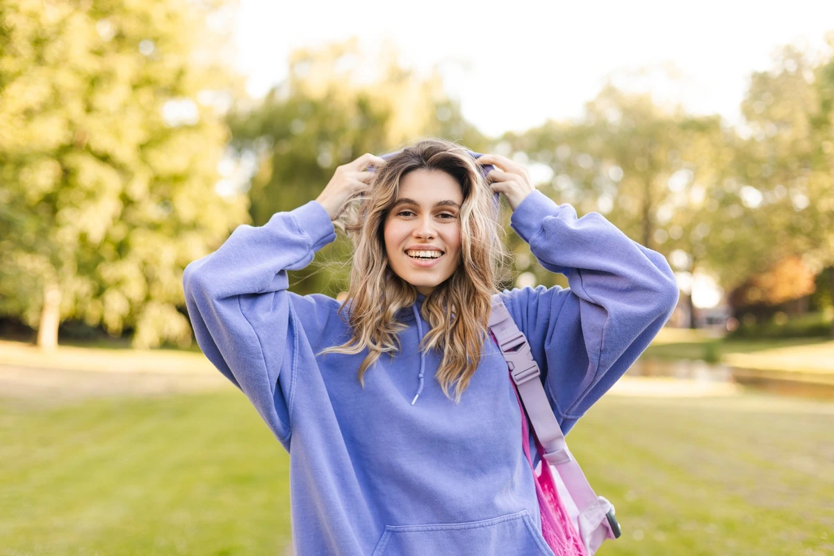 A smiling woman outdoors